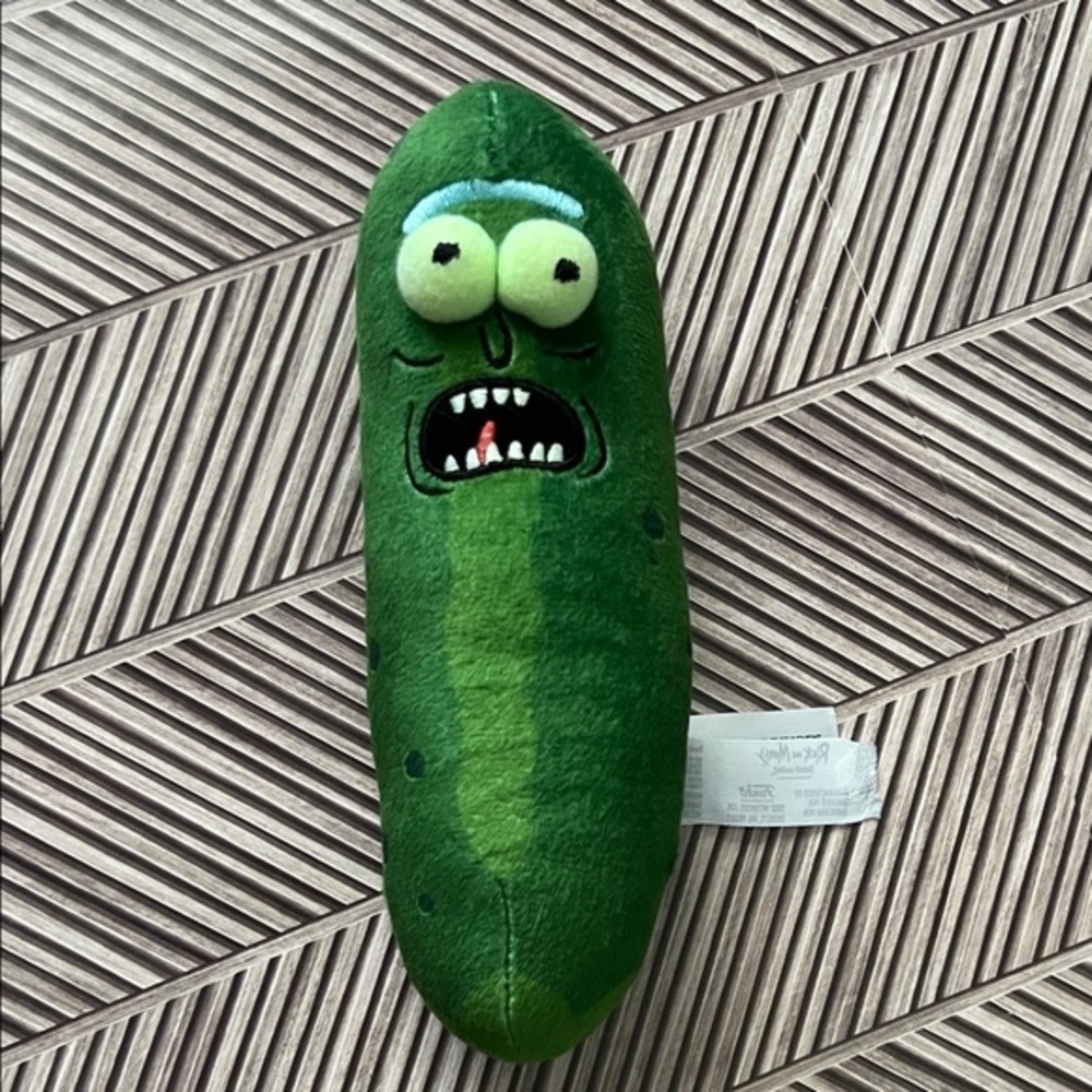 Funko Galactic Plushies Pickle Rick from the animated TV series Rick and Morty.